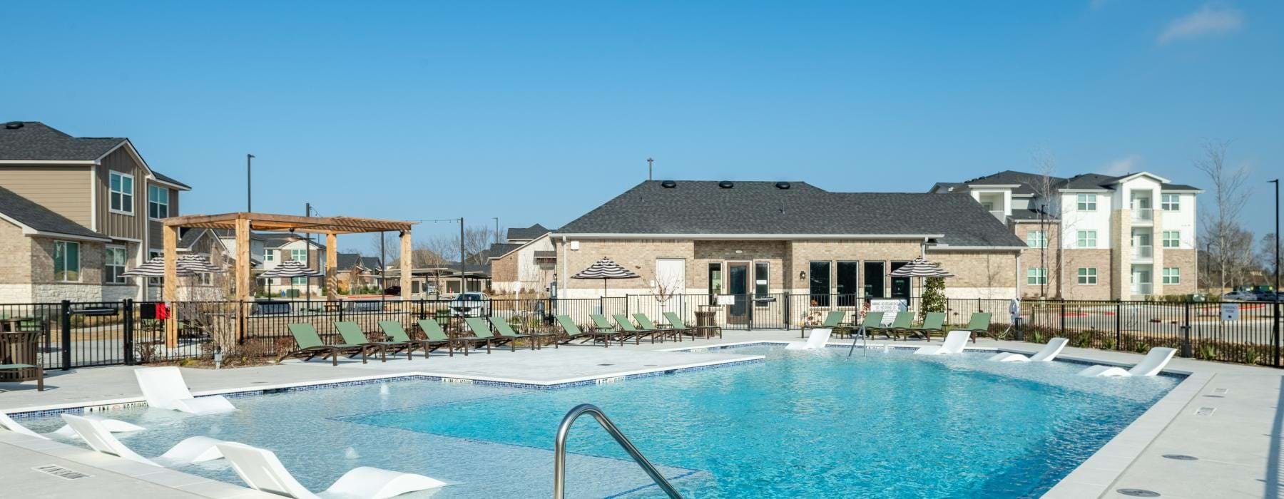 a swimming pool in a backyard