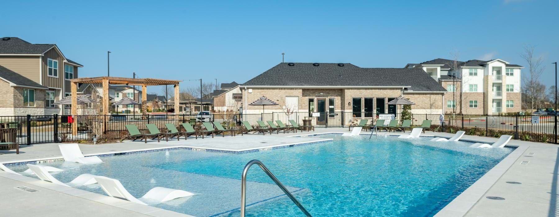 a swimming pool in a backyard